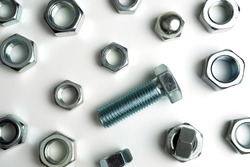 abstract background of a scattering of bolts and nuts
