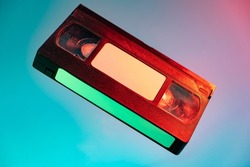 Old video tape on colorful background. VHS video tape. Retro, vintage concept.
