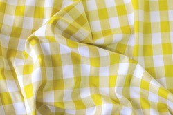 Seamless checkered. Vintage yellow plaid fabric texture. Abstract geometric background. Tablecloth for picnic Texture.
