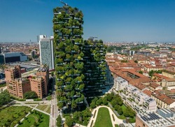 Aerial photo of Bosco Verticale, Vertical Forest, in Milan, Porta Nuova district. Residential buildings with many trees and other plants in balconies