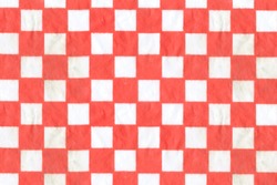 Close up of a Red and White Checkered Square Sheet, Wax Paper Food Basket Liner.
