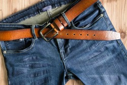 Blue jeans with leather belt