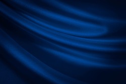  Black blue abstract background. Dark blue silk satin texture background. Shiny fabric with wavy soft pleats. Dark blue elegant background with copy space for your design. Liquid wave effect.         