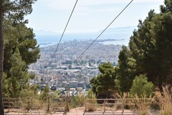 View of the city of Trapani as seen behind the steel cables that guide the cable cars on Monte Erice