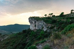 View of Pic Saint-Loup and the Hortus mountain from the Puech des Mourgues in Saint-Bauzille-de-Montmel during sunset (Occitanie, France)