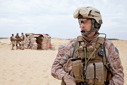 US marines in the desert near the blockpost