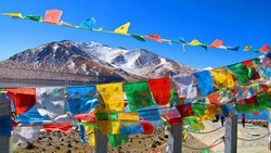 Colorful Tibetan prayer flag. each flag have Tibetan language prayer  chant