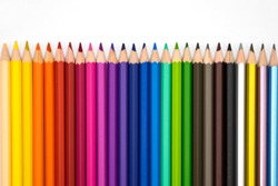 row color pencils on white background