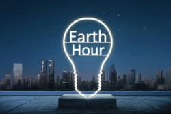 Earth hour text inside of lights bulb. Earth Hour Concept