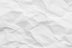 White crumpled paper texture background.