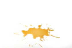 Liquid stain dirty splashing on floor. Tea or coffee stain splash on white background. Yellow brown stain of  liquid pouring on white surface