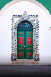 old wooden door in tlemcen algeria with arabic and islamic style art , tlemcen algeria north africa	
