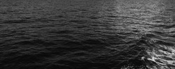 black sea water texture. water reflection texture background. Dark background. Timeline banner and cover page. Ocean dark nature background and banner. Black Water Texture.