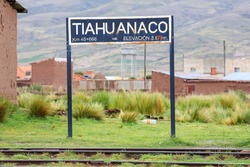 Signboard of the abandoned train station outside the Tiwanaku (Tiahuanaco) ruins in western Bolivia. Tiwanaku is a Pre-Columbian site near Lake Titicaca, and one of the largest in South America.