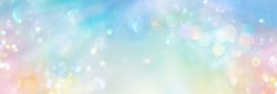 Pastel colored banner of abstract sparkling lights in a cosmic field of  pure energy with plenty of copy space for individual text and design