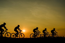  ride bicycle on sunset background