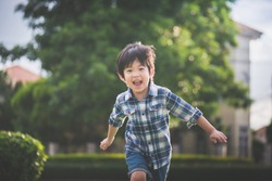 Asian child playing in the park