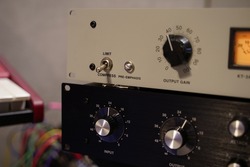 Close-up photo of audio recording compressors in studio. Analog outboard gears for mixing and recording