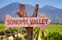 Sonoma Valley wooden sign with winery background