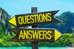 Questions Answers signpost in a beach background