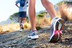 trail running marathon fitness feet on rock fitness and healthy lifestyle
