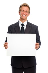 Attractive man in business suit with blank sign