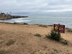 Sunset Cliffs - Warning signs and beautiful scenery at Sunset Cliffs San Diego