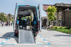 moving van with ramp for the transport of disabled people  or van to transport disabled people or mobility van for disabled people or van for handicapped people 