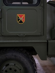 Detail of the artillery insignia on the door of a Teruel MRL missile launcher truck