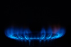 Close up shot of stove gas on dark background