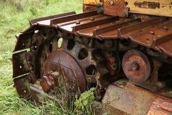 An old farm tractor tracks