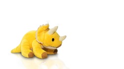 Yellow dinosaur doll on a white background