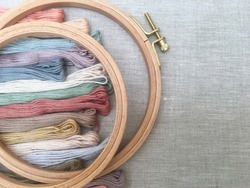 embroidery hoop, floss thread, natural linen fabric