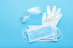 Medical mask, Medical protective masks and white rubber gloves, glasses. Coronavirus, Covid-19 protection by respirator, surgical face mask. Concept medicine health care.Medical sterile equipment
