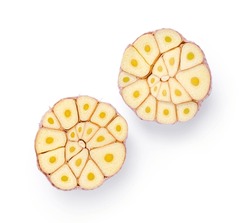 Two half of garlic isolated. Top view of fresh garlic on white background.
