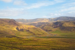 Rugged mountain Icelandic terrain in rural countryside landscape and valley in Hengill,  Iceland.