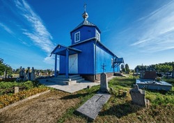 General view and architectural details of the Orthodox Cemetery Church of St. Elijah built in the second half of the 20th century in the town of Hryniewicze Duze in Podlasie, Poland.