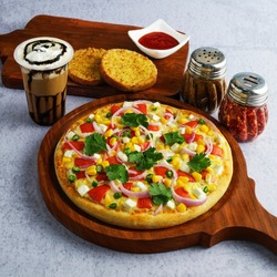 Veg Pizza with Garlic Bread, Chocolate Shake, Sauce, oregano and red chilli flakes