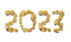 2023 Written with Potato Chips Isolated on White Background, Happy New Year 2023 Conceptual Photo