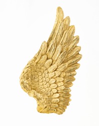 Golden angel wing isolated on white backgorund. Beautiful mythological wing. Gold design element. Divinity concept.
