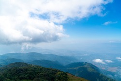 beautiful mountain layer with clouds and blue sky at  Kew Mae Pan Nature Trail in Chiang Mai, Thailand