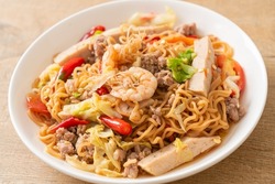 Instant noodles spicy salad on plate in Asian style - Thai food style