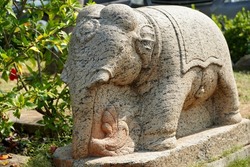 Elephant sculpture carved in the stone at a Hindu temple in Mahabalipuram, Tamilnadu.