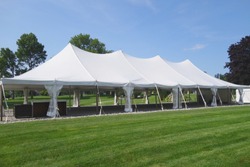 large white events or wedding tent on a summer's day 
