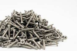 tapping screws made od steel, metal screw, iron screw, chrome screw, screws as a background, wood screw,on white background