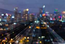 Blur night light city business downtown double exposure train track, abstract background