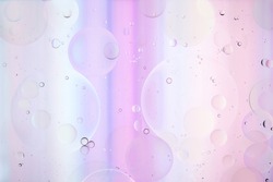 Colorful artistic image of oil drop on water for modern and creation design background.
