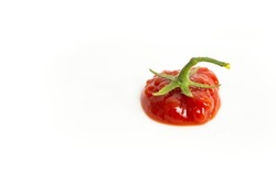 Ketchup blob with a star shaped tomato stem, isolated on white background