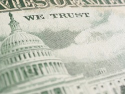 American paper money background. Fragment of reverse of $50 bill showing the Capitol. US banknote closeup. Backdrop about public national debt and the USA dollar. Bonds and treasurys. Macro