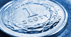 Translation: 1 zloty. Fragment of Polish one zloty coin close-up. National currency of Poland. Blue tinted illustration for news about economy or finance. Horizontal stories. Macro